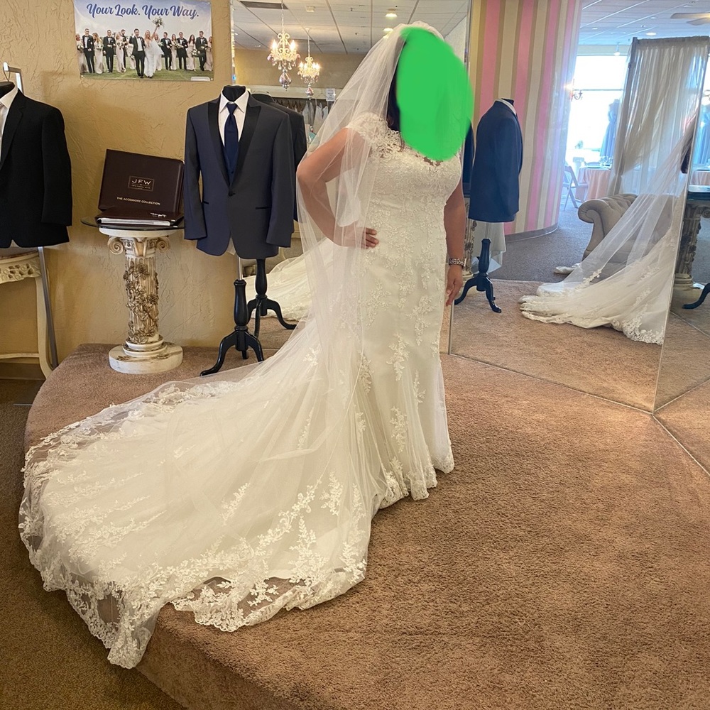 New wedding dress. Size 12. Altered to fit me. I am 5’0 with 3” heels